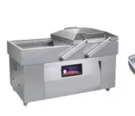 Double chamber vacuum sealer