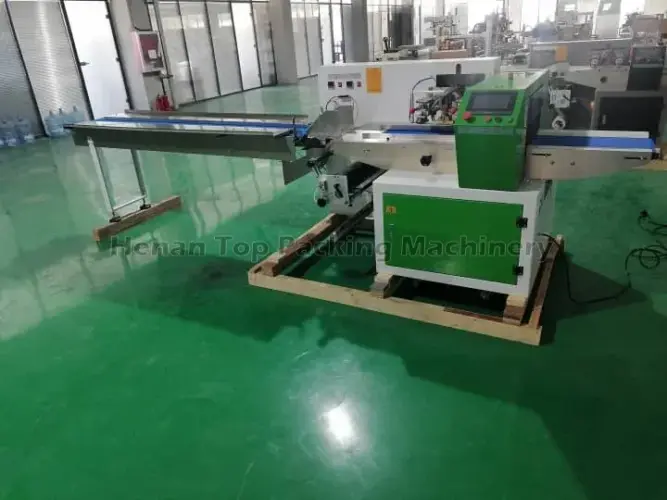 Flow wrap packing machine